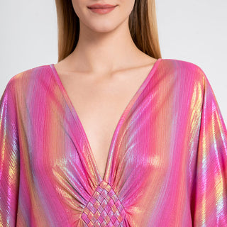 A woman wearing a Pink V Neck Sparkly Kaftan Dress.