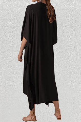 black pool cover up dress in the beach