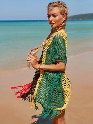 A woman wearing best crochet mesh skirt at the beach